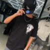 POLERA PINPOKE CALABERA POISON BLACK BRILLANTE OVERSIZE