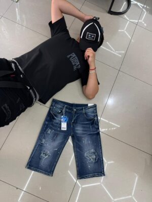 WhatsApp Image 2026-01-30 at 3.45.54 PM SHORT JUNJIE NIÑO AZUL BASICO Y54