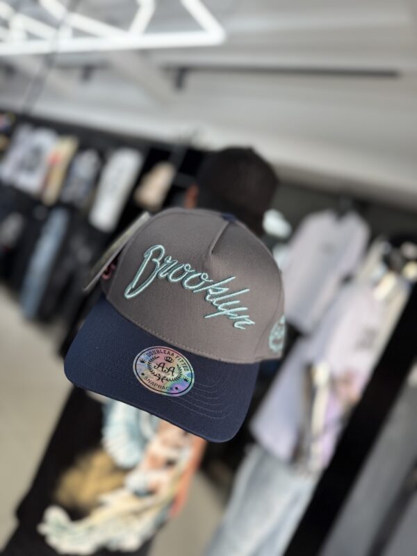 JOCKEY DOBLE AA CURVO BROOKLYN GRIS-AZUL HOMBRE AJUSTABLE