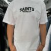 POLERA SAINTS RESTRITED MCMLXXXVIII ADIAMANTADO WHITE OVERSIZE
