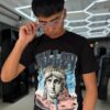 POLERA ESTATUA DE LA LIBERTAD NEGRA BRILLANTE ORIGINALS NIÑO