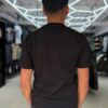 POLERA ESTATUA DE LA LIBERTAD NEGRA BRILLANTE ORIGINALS NIÑO