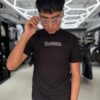 POLERA RESTRICTED NEGRA - ESTATUA DE LA LIBERTAD NIÑO BRILLANTE ORIGINALS