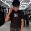 POLERA 18 NEGRA ORIGINALS NIÑO