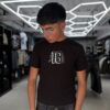 POLERA 18 NEGRA ORIGINALS NIÑO
