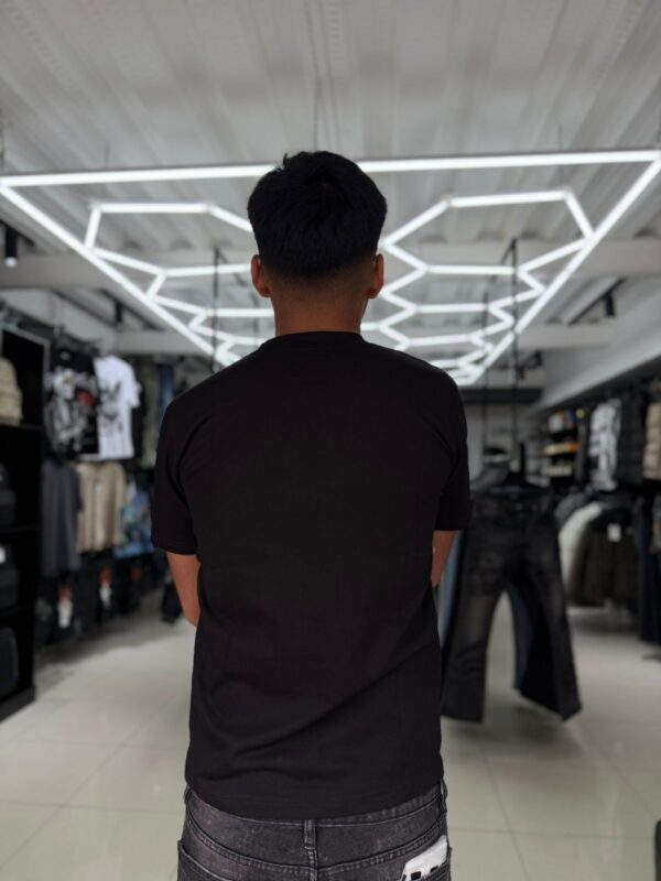 POLERA VALLEY DREAMS NEGRO SLIM FIT NIÑO BRILLO