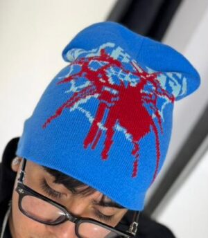 WhatsApp Image 2026-05-21 at 3.03.28 PM GORRO DE LANA ARAÑA ROJO-AZUL