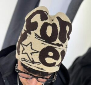 WhatsApp Image 2026-05-21 at 5.21.25 PM GORRO DE LANA CHROME HEARTS BEIGE Y CAFÉ