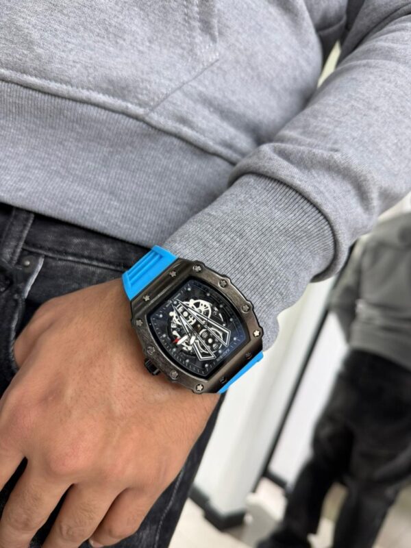 RELOJ KADIBIN CELESTE METALICO