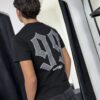 POLERA ANGEL LUAP DISTRICT BRILLO REGULAR FIT NEGRO