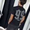 POLERA ANGEL LUAP DISTRICT BRILLO REGULAR FIT NEGRO