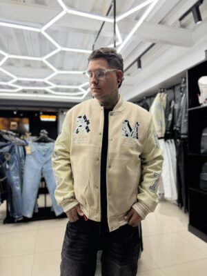WhatsApp Image 2026-06-23 at 1.42.23 PM CHAQUETA AM CREMA-BLANCO CUERINA JH97003