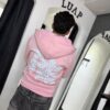 POLERON EMOTION NEVER ME ROSA OVERSIZE