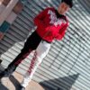 POLERON EMOTION NEVER ME ROJO OVERSIZE