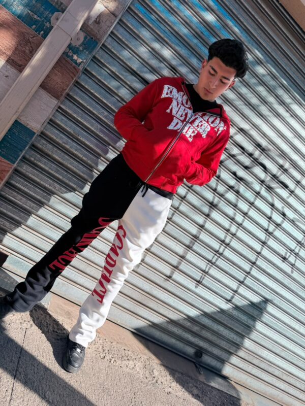 POLERON EMOTION NEVER ME ROJO OVERSIZE