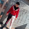 POLERON EMOTION NEVER ME ROJO OVERSIZE