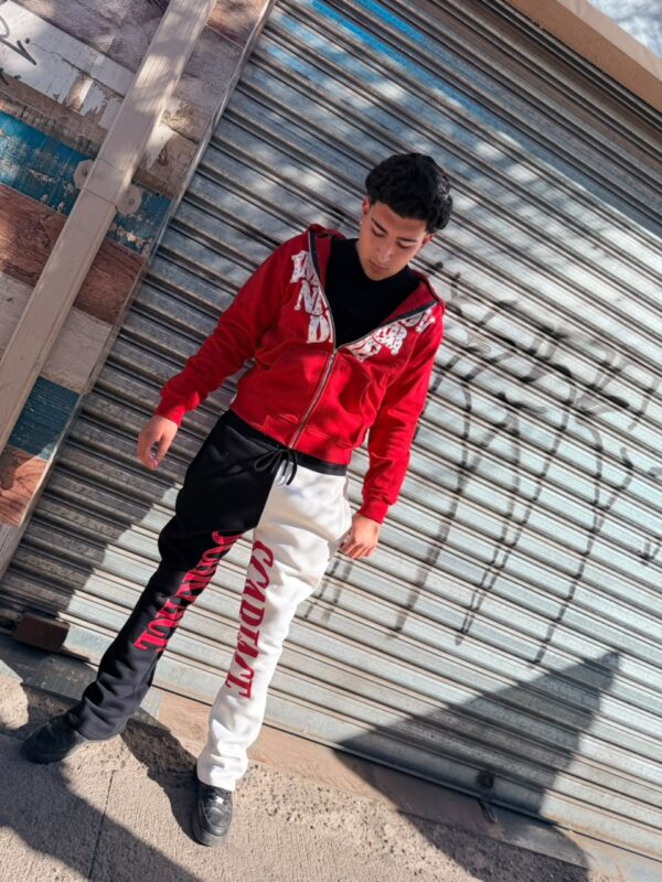 POLERON EMOTION NEVER ME ROJO OVERSIZE