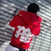 POLERON EMOTION NEVER ME ROJO OVERSIZE