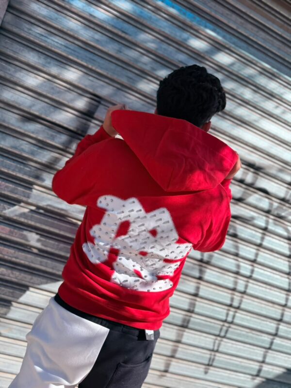 POLERON EMOTION NEVER ME ROJO OVERSIZE