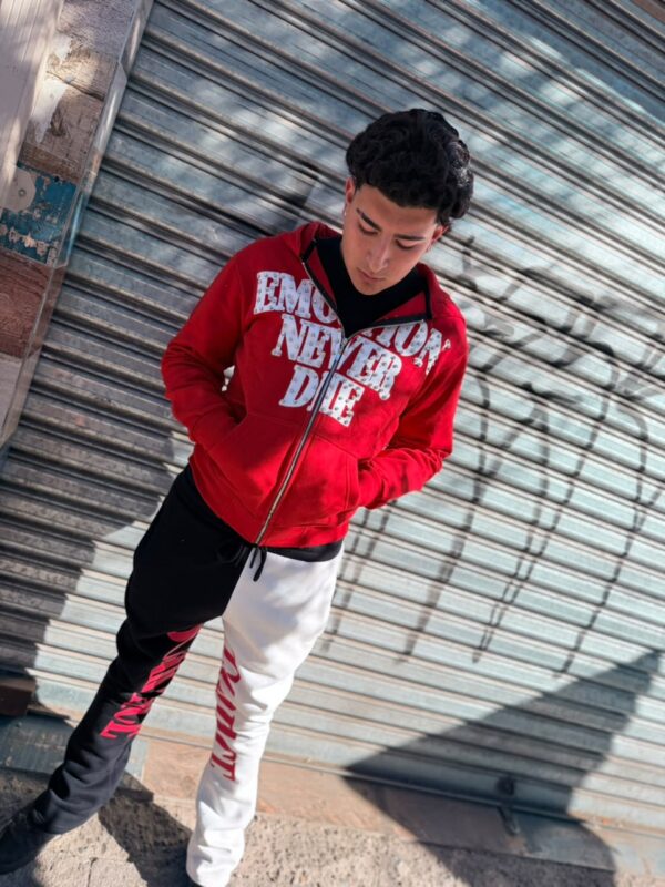 POLERON EMOTION NEVER ME ROJO OVERSIZE