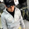 POLERON EMOTION NEVER ME GRIS OVERSIZE