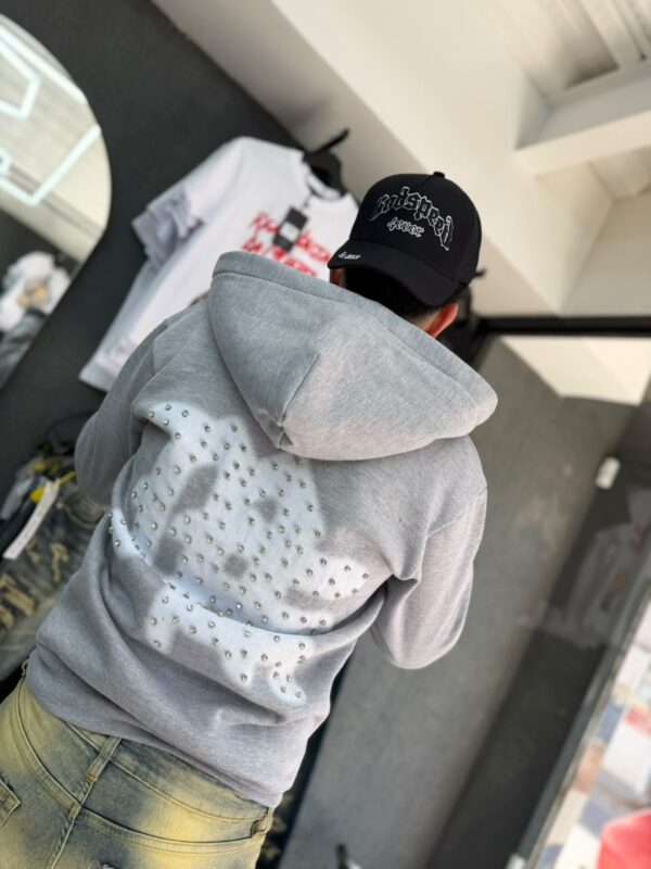 POLERON EMOTION NEVER ME GRIS OVERSIZE