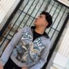 POLERON EMOTION ANGEL SIN VER GRIS CLARO REGULAR FIT