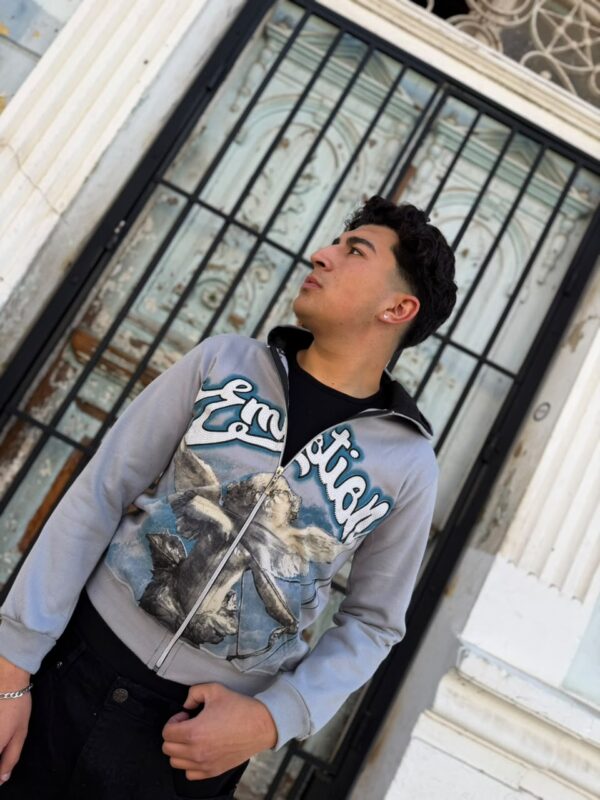 POLERON EMOTION ANGEL SIN VER GRIS CLARO REGULAR FIT