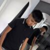 POLERA PIQUE GUESS NEGRA LINEA