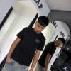 POLERA CUELLO EA7 LINEAS AL LADO NEGRO