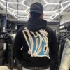 POLERON EMOTION NEGRO BRILLO NEGRO Y AZUL ANGEL MOTO